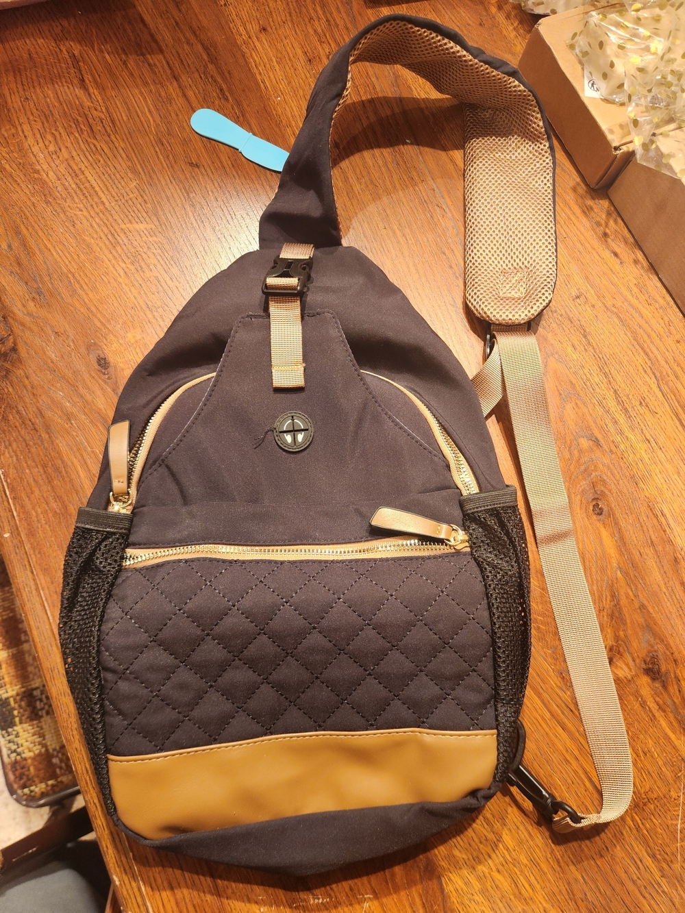 Men's Black Sling Backpack with Tan Accents